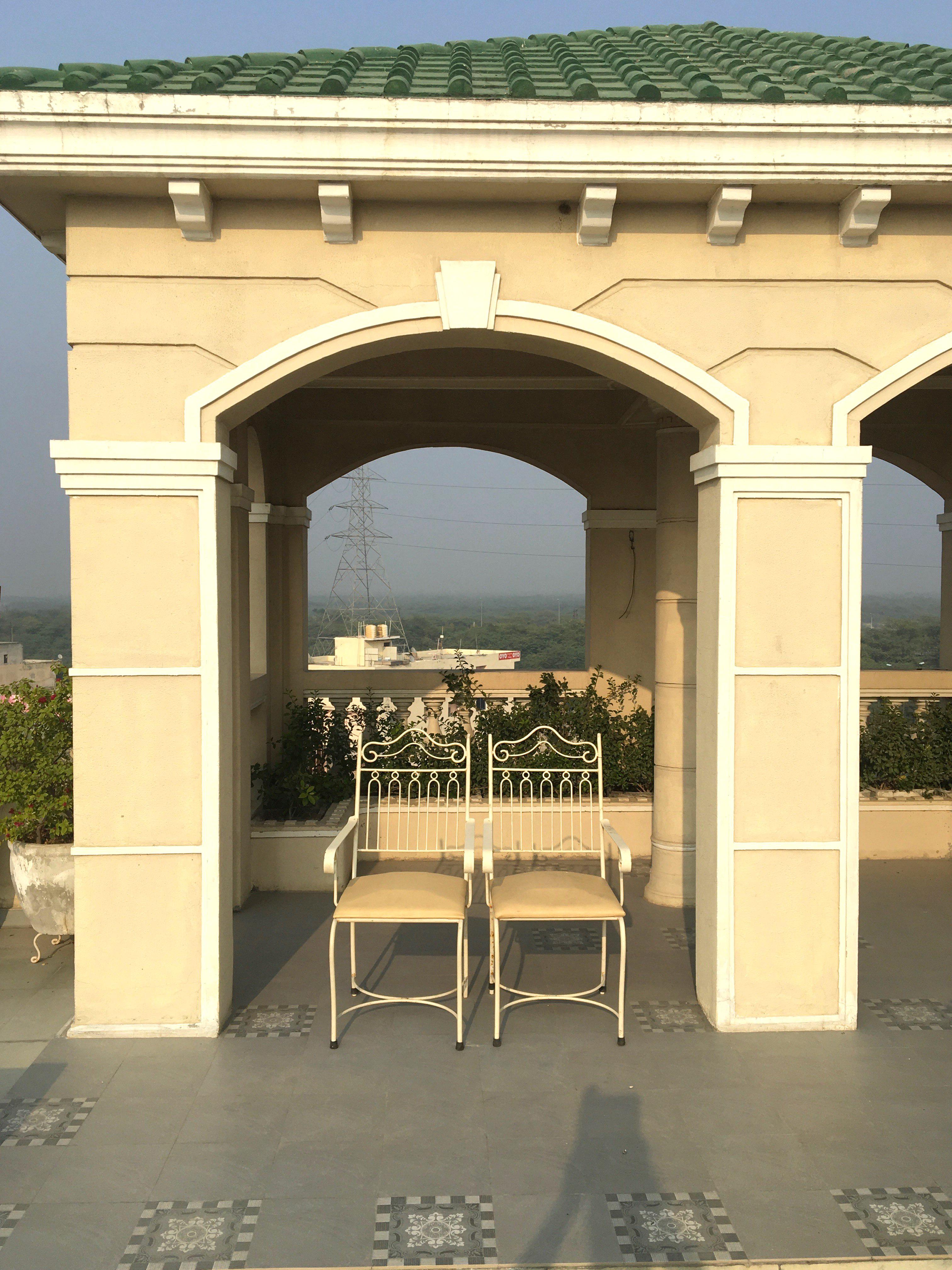 Seating areas with classic Roman architectural elements